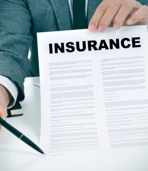 insurance form held in hand image